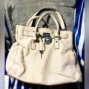 Michael slots Hamilton Cream Colored Pebbled Leather Lock & Key Shoulder Bag